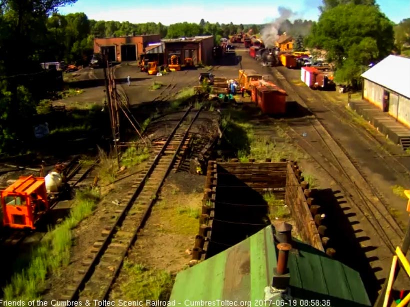 6-18-17 Coming out of south yard with an extra coach for today's train.jpg