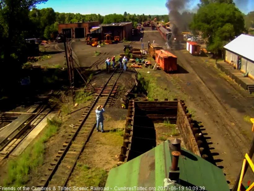 6-18-17 With the volunteers of session C hard at work, train 216 pulls from the depot.jpg