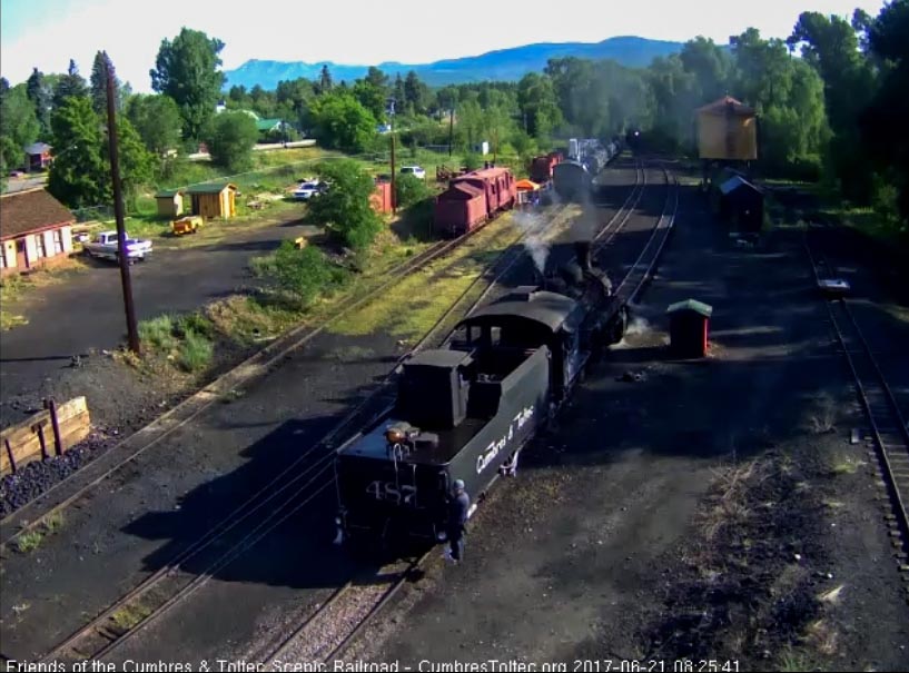 6-21-17 487 backs down the main toward the coal dock lead as 489 comes back from an early morning jaunt.jpg