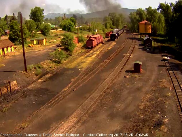 6-25-14 The final cars of train 216 exit around the curve.jpg