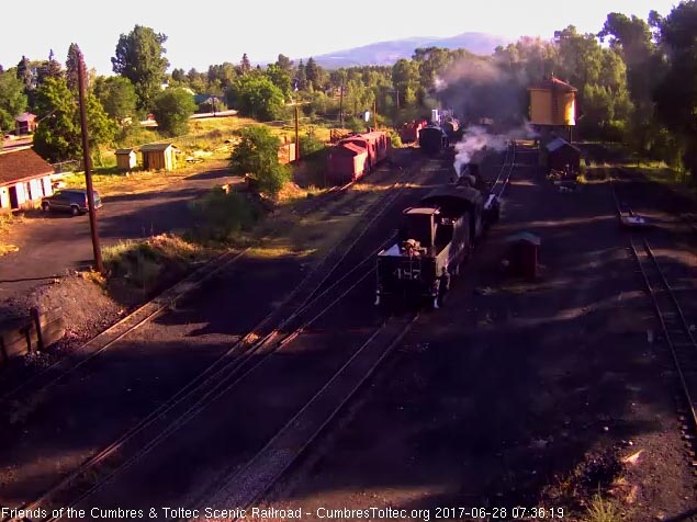 6-28-17 The sun has not yet hit the north yard tracks as 487 backs down toward the coal dock.jpg