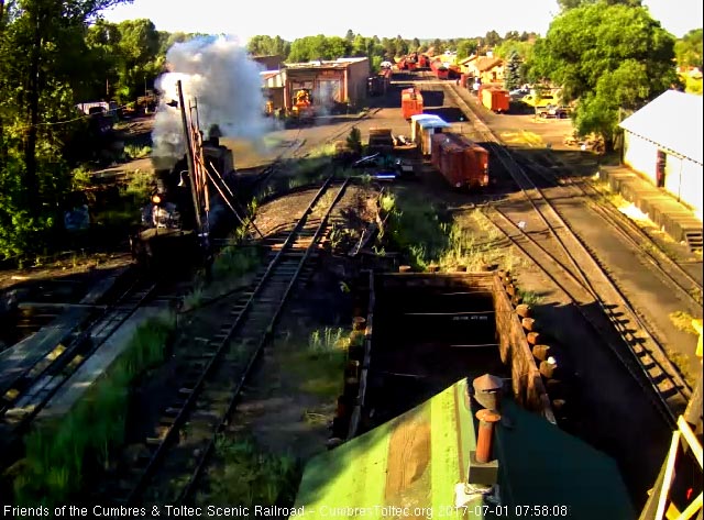 7-1-17 487 passes through the shaft of early sunlight as it moves to the pit.jpg