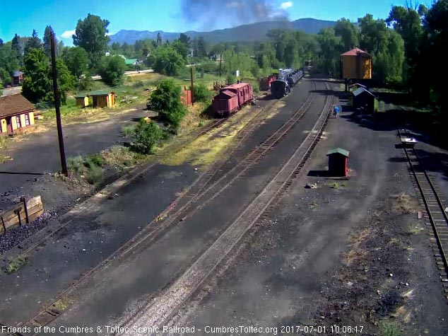 7-1-17 The last cars of the train round the curve north of town.jpg