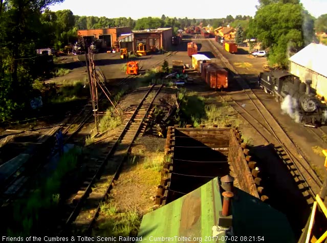 7-2-17 The 463 backs away from the coal dock past the wood shop.jpg