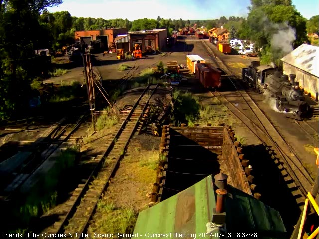 7-3-17 The 489 pulls past the wood shop as it moves to the dock.jpg