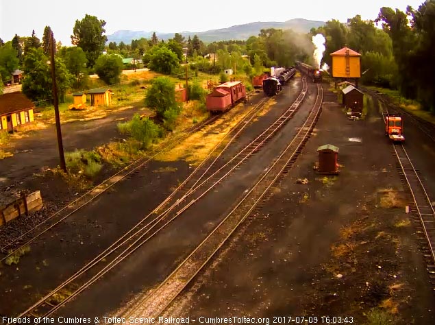 7-9-17 The cool, damp air gives a nice steam effect as 215 comes into Chama.jpg