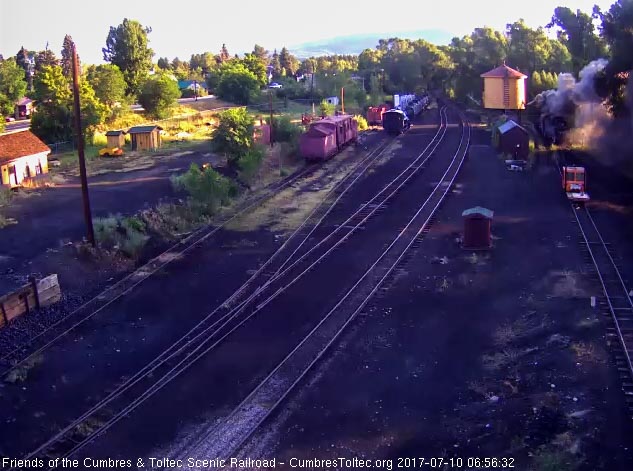 7-10-17 The 487 moves down to the tank under a hanging pawl of smoke in the cool morning air.jpg