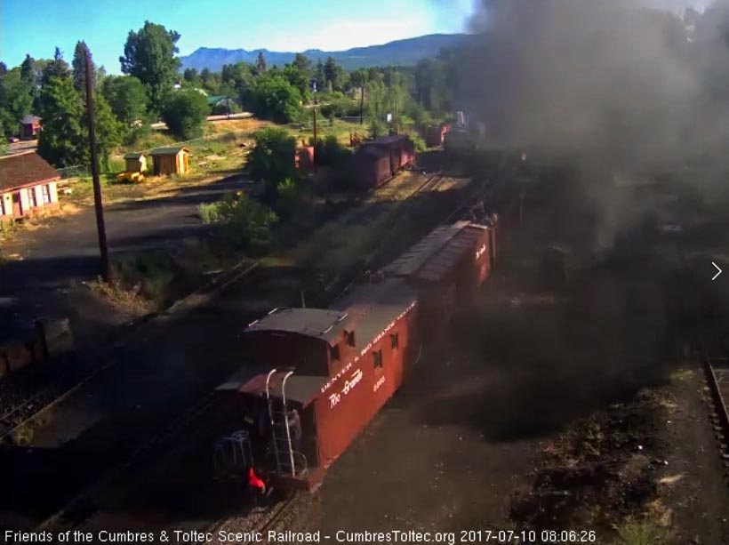 7-10-17 As the caboose passes the tipple, we can see how heavy the smoke is hanging in the air today.jpg