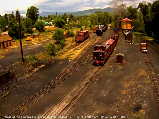 7-10-17 The 487 stops for water before the afternoon school train leaves Chama.jpg