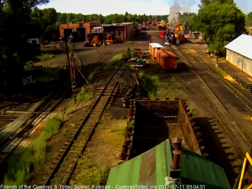 7-11-17 Coming out of south yard with an extra coach for today's train.jpg