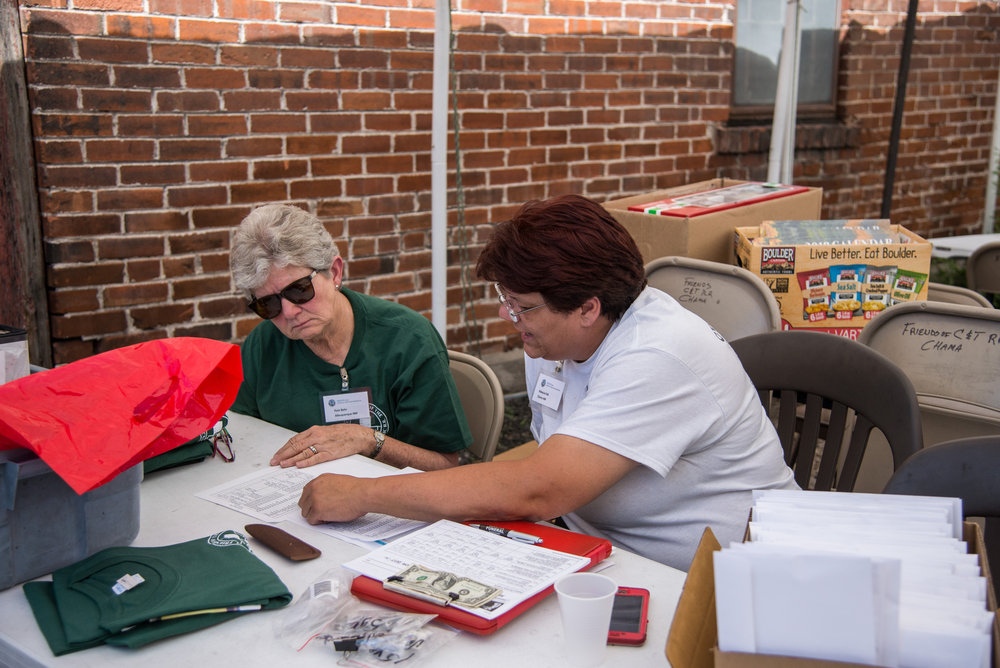 7-23-17 Pam Behr and Beckie Falk work on getting everyone registered.jpg