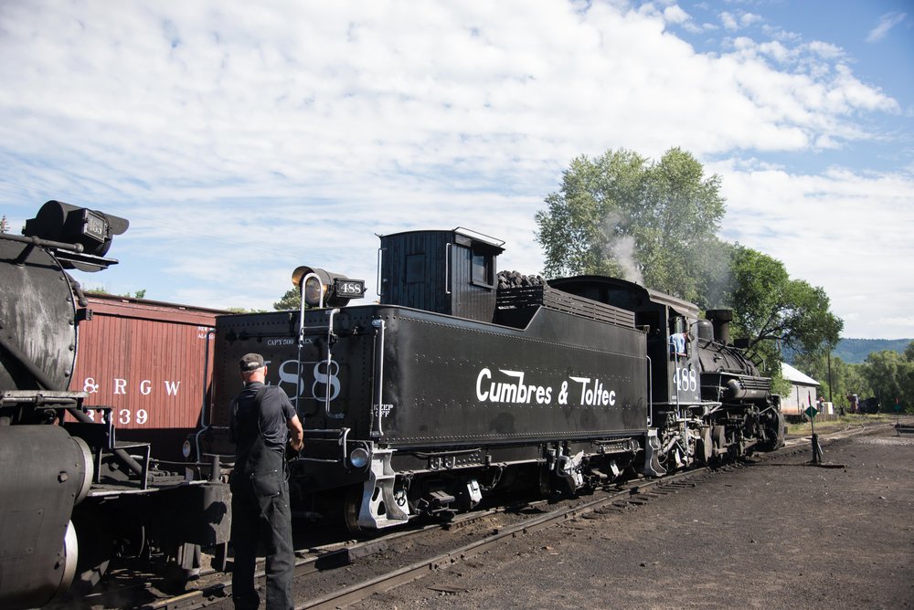 8 Road crewmember Tracy directs K36 488 as it backs down to couple onto train 216.jpg