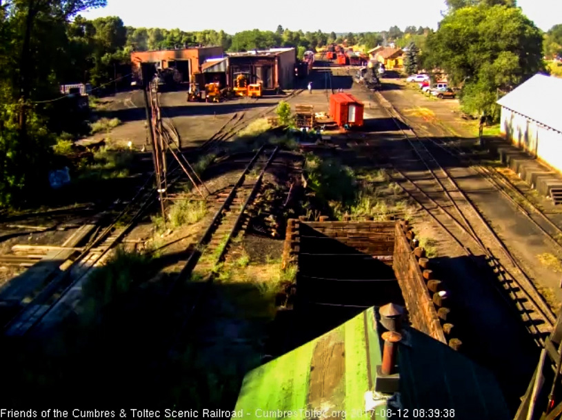 8-12-17 463 has backed down to near the train to await its road crew.jpg