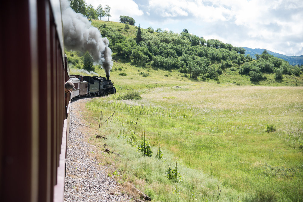 7 The train rounds a curve as it climbs away from Lobato.jpg