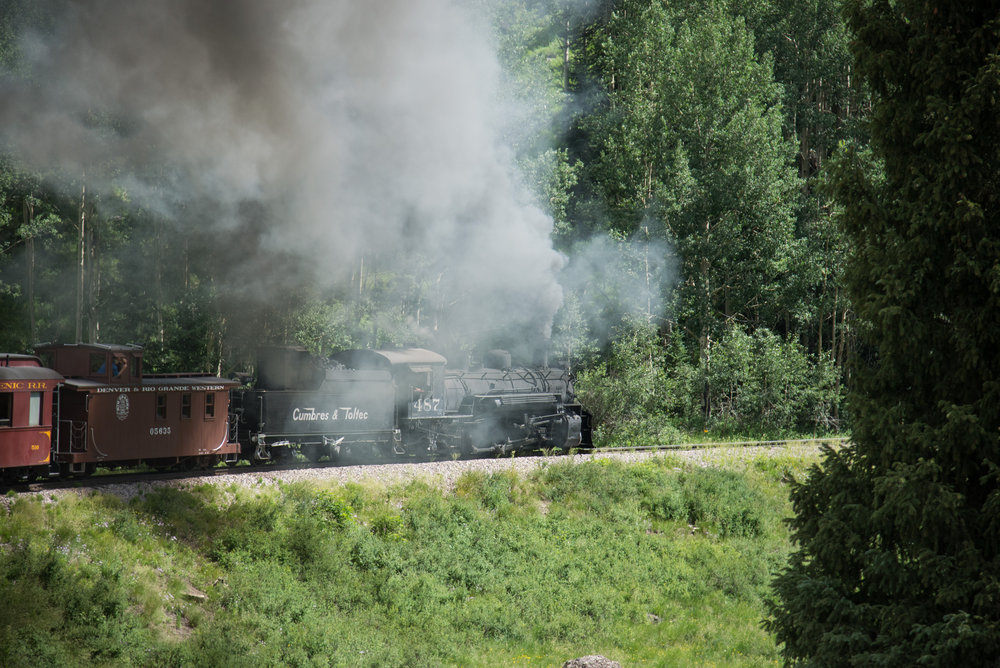 14 The 487 smokes it up as one of the caboose riders takes it picture from the cuppola.jpg