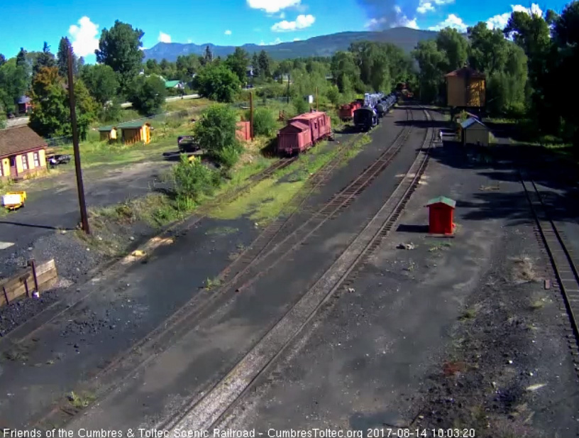 8-14-17 The train is clearing Chama yard as the speeder is on the main to follow.jpg