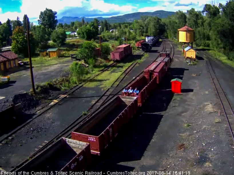 8-14-17 Three of the students are riding in the open gon as the train gets back into Chama.jpg