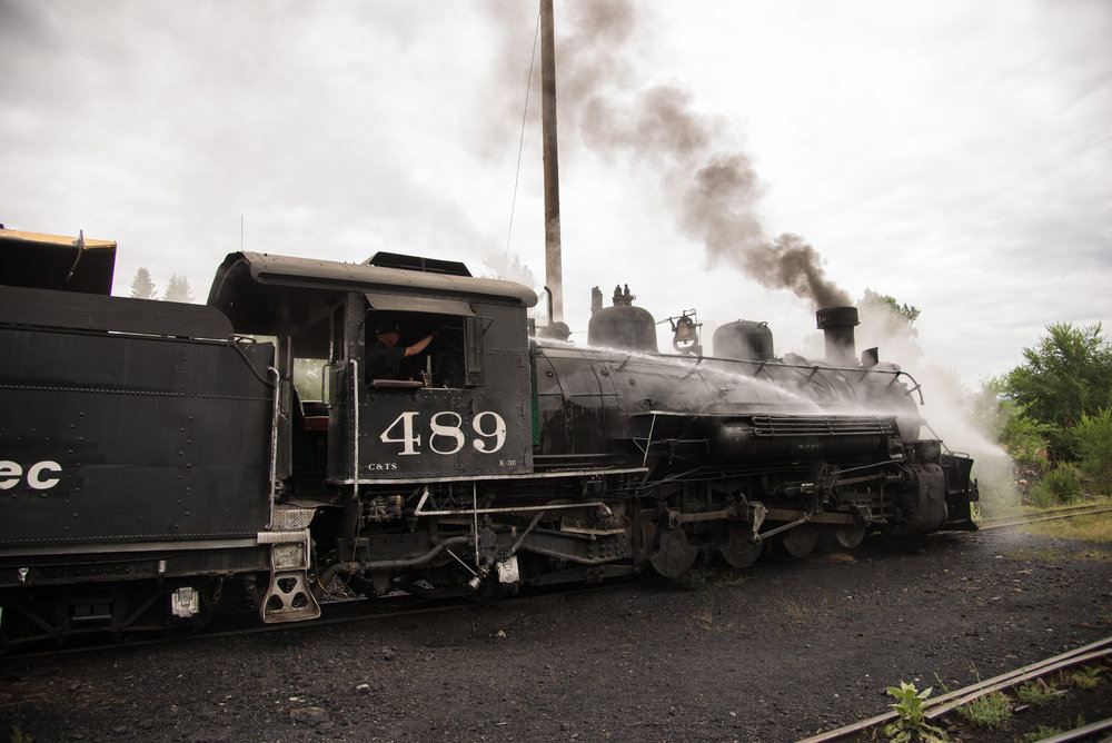 8 Tracy, who wants a clean locomotive, is washing down the boiler.jpg