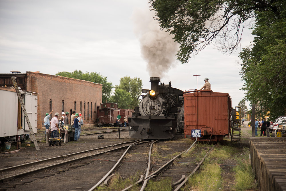 16 As 489 departs with train 216, the Friends stop and wave to the passengers.jpg