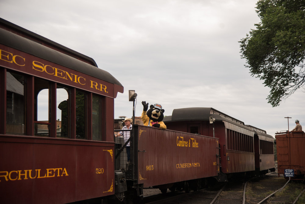 18 A nice wave from Cinder Bear as the train passes.jpg