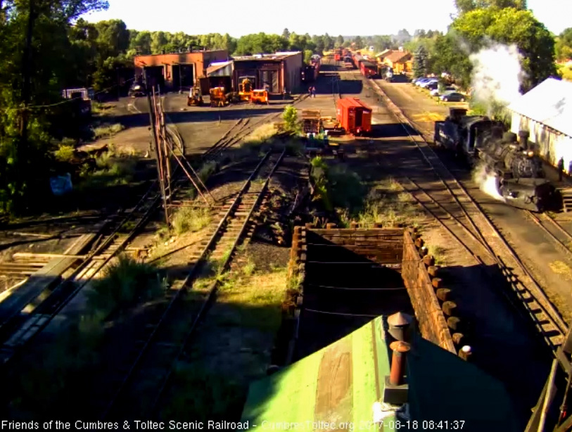 8-18-17 Frank is on the platform of the wood shop watching 489 pull by.jpg