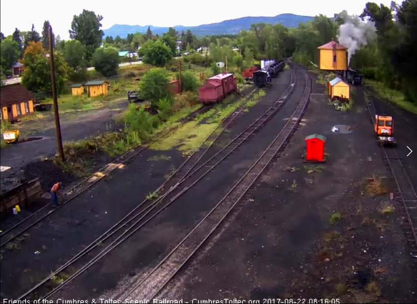 8-22-17 487 is at the tank to fill the tender and one of the hostlers is climbing up the tank.jpg