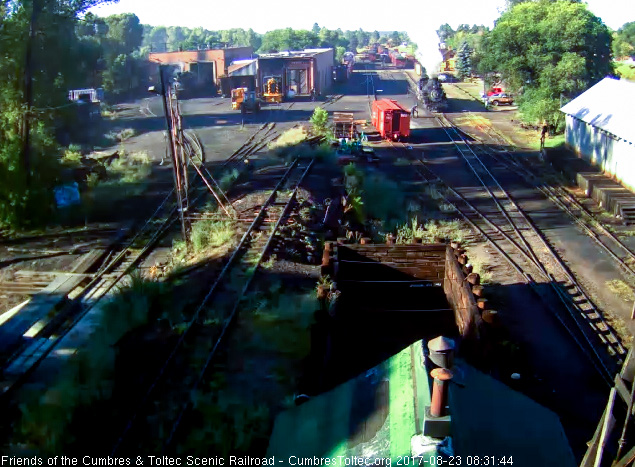8-23-17 Clear of the switch to the north yard and coal dock, one of the hostlers opens the switch.jpg