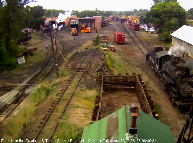 8-26-17 As 488 backs toward the switch to the coal dock, 315 emerges from the house.jpg