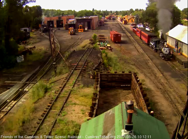 8-26-17 As 315 comes past the wood shop, we see an American flag on the front beam.jpg