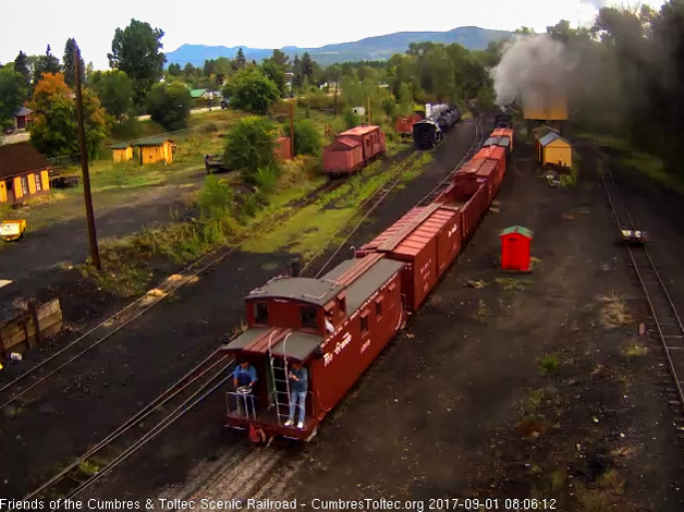 9-1-17 The train is by the tipple and there are a few lucky riders beside the crew.jpg