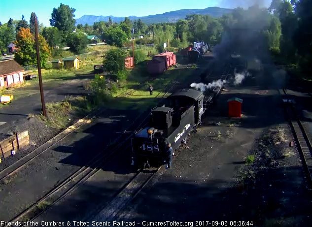 9-2-17 488 backs toward the lead switch to the coal dock while Frank looks on and waves.jpg