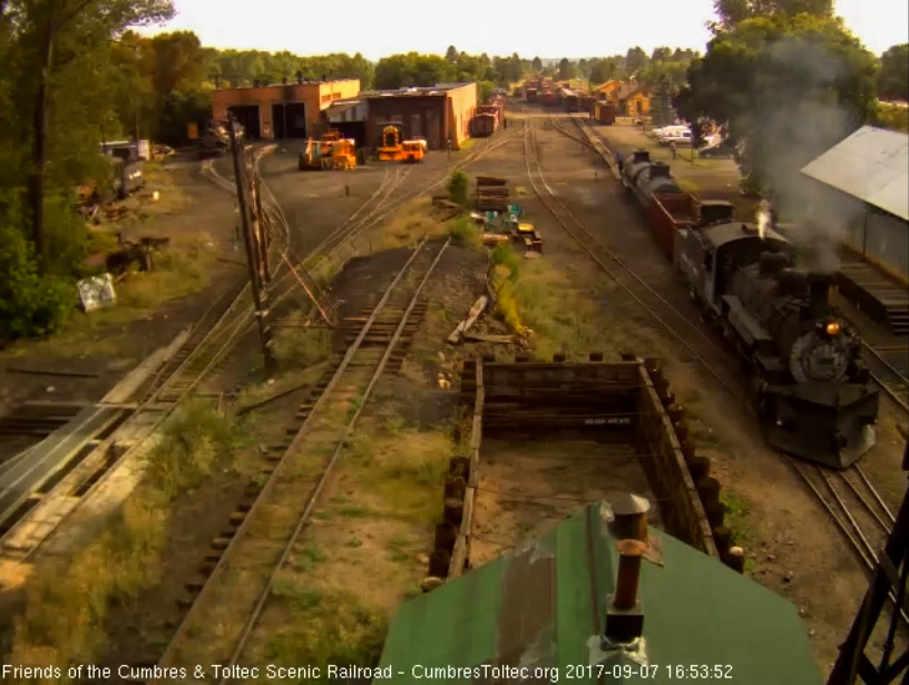 9-7-17 489 comes out of south yard with a high sided gon and 2 tank cars.jpg