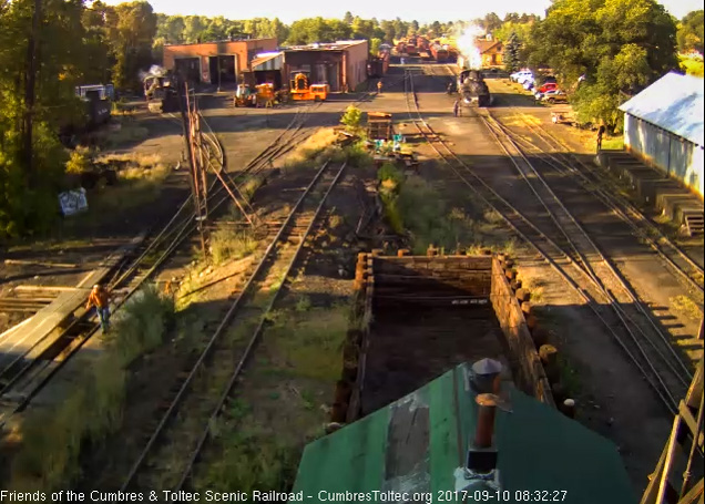 9-10-17 Here we have a nice grouping of the C&TS workings, Julian is at the pit hosing it down, Tracy, one of the road crew, is ready to board the 489 and a hostler is closing the lead switch.jpg