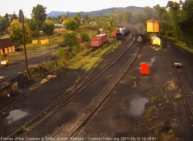 9-12-17 The 487 is by the tank as it comes into Chama with its long, 10 car train.jpg