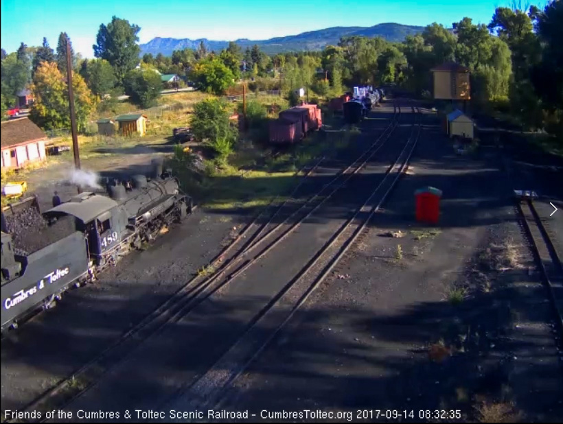 9-13-17 The loader puts another bucker load of coal into the bunker of the 489's tender.jpg