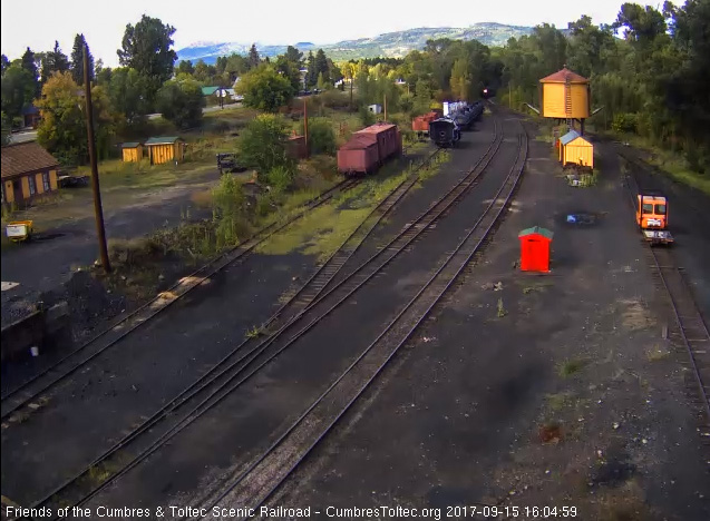 9-15-17 The headlight of 489 shines out from the trees at the north end of the yard.jpg