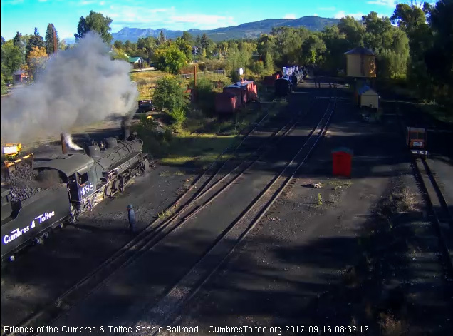 9-16-17 As one of the hostlers watches, the other drives the loader putting coal into the bunker of 488.jpg