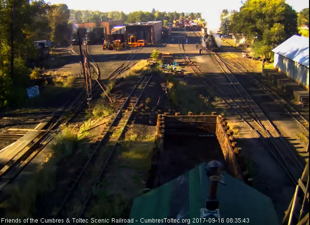 9-16-17 As one of the hostlers closes the lead switch, Tracy walks toward the 488 to begin his prep of the locomotive.jpg