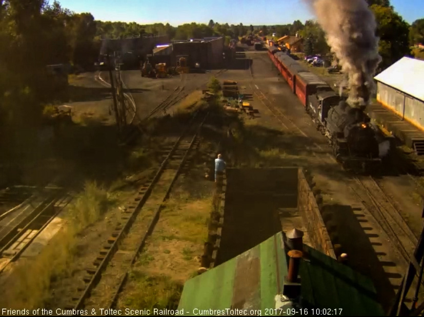 9-16-17 The 488 comes by the wood shed as it gets its 8 car train up to speed.jpg