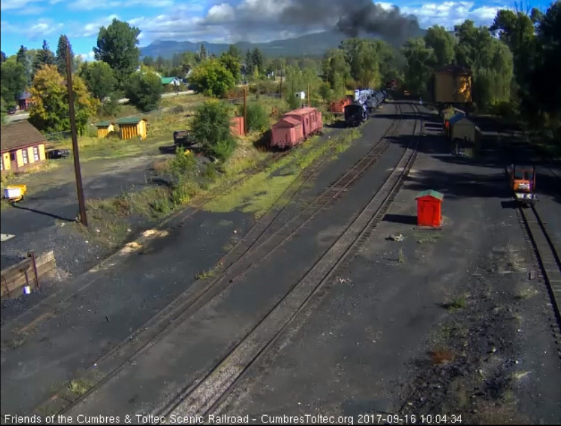 9-16-17 The last cars of train 216 round the curve north of the yard as the speeder takes the main.jpg