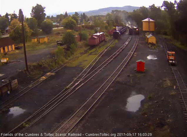 9-17-17 The 488 comes by the 463 as it brings its 8 car train into Chama.jpg