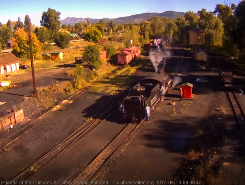 9-18-17 Finished with cleaning and watering, the 463 backs toward the coal dock lead with both a student and mentor on the tender.jpg