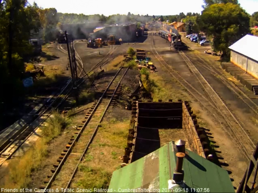 9-18-17 After a bunch of movement in south yard, they come out with one coach and 3 stock cars which go on their train.jpg