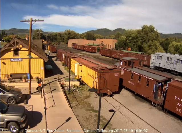 9-19-17 The caboose goes by with the conductor on the front platform.jpg