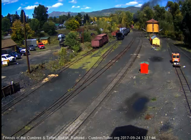 9-24-17 The orange on the RGS caboose is clearly visible as the train round the curve.jpg