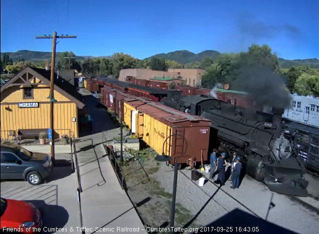 9-25-17 The 489 comes by the depot as the cleaning crew and hostlers confur.jpg