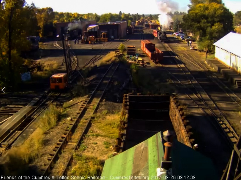 9-26-17 The 487 has moved out and is in the video shadow of the tipple and 463 has gone into south yard and come out with an extra coach.jpg