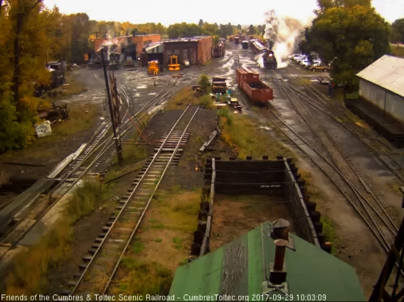 9-29-17 The 489 works on the wet rail to get the 8 car train 216 moving.jpg