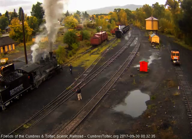 9-30-17 463 has coal added to its bunker as the fireman stokes the fire.jpg