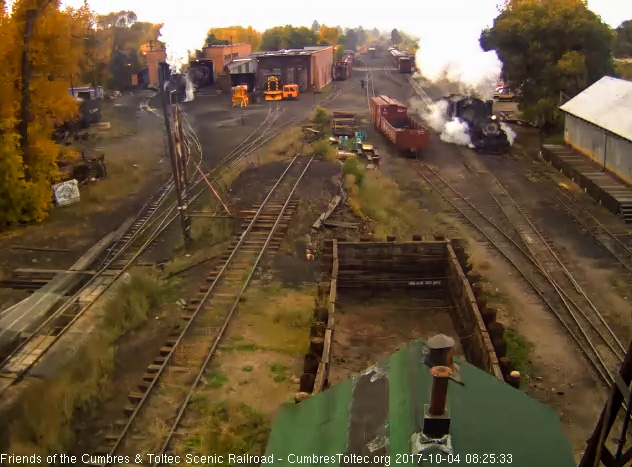 10-4-17  As 463 pulls into the lead for the coal dock, 488 shoves that other locomotive into the west stall.jpg